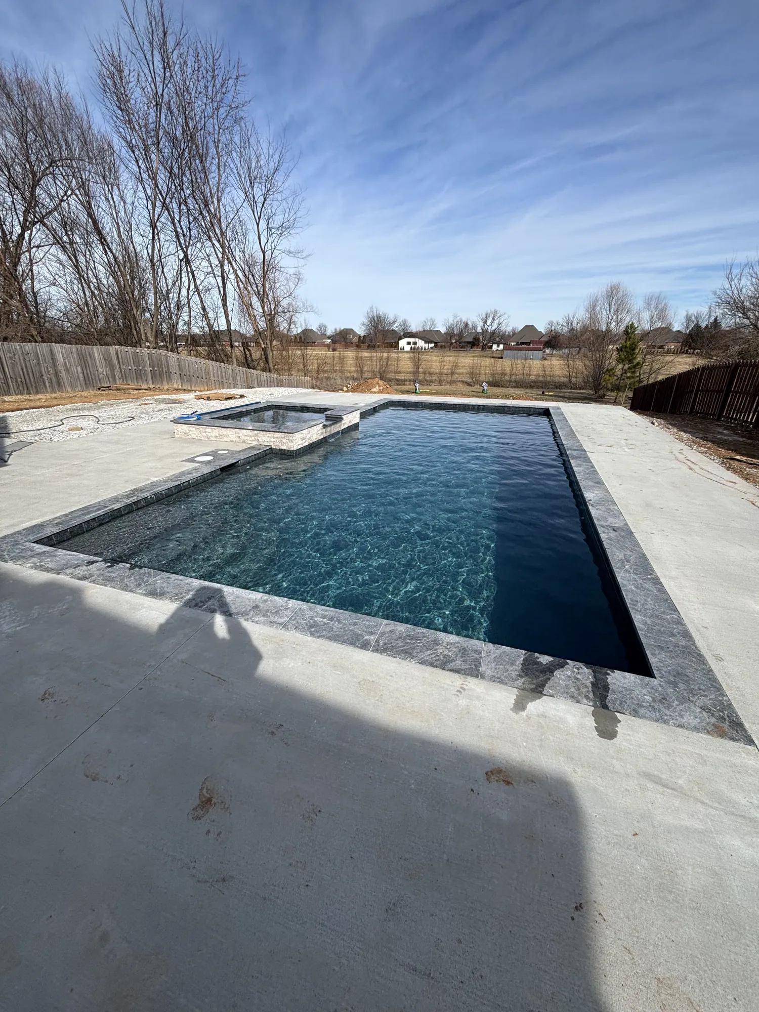 Completed in-ground pool and spa build in Northwest Arkansas