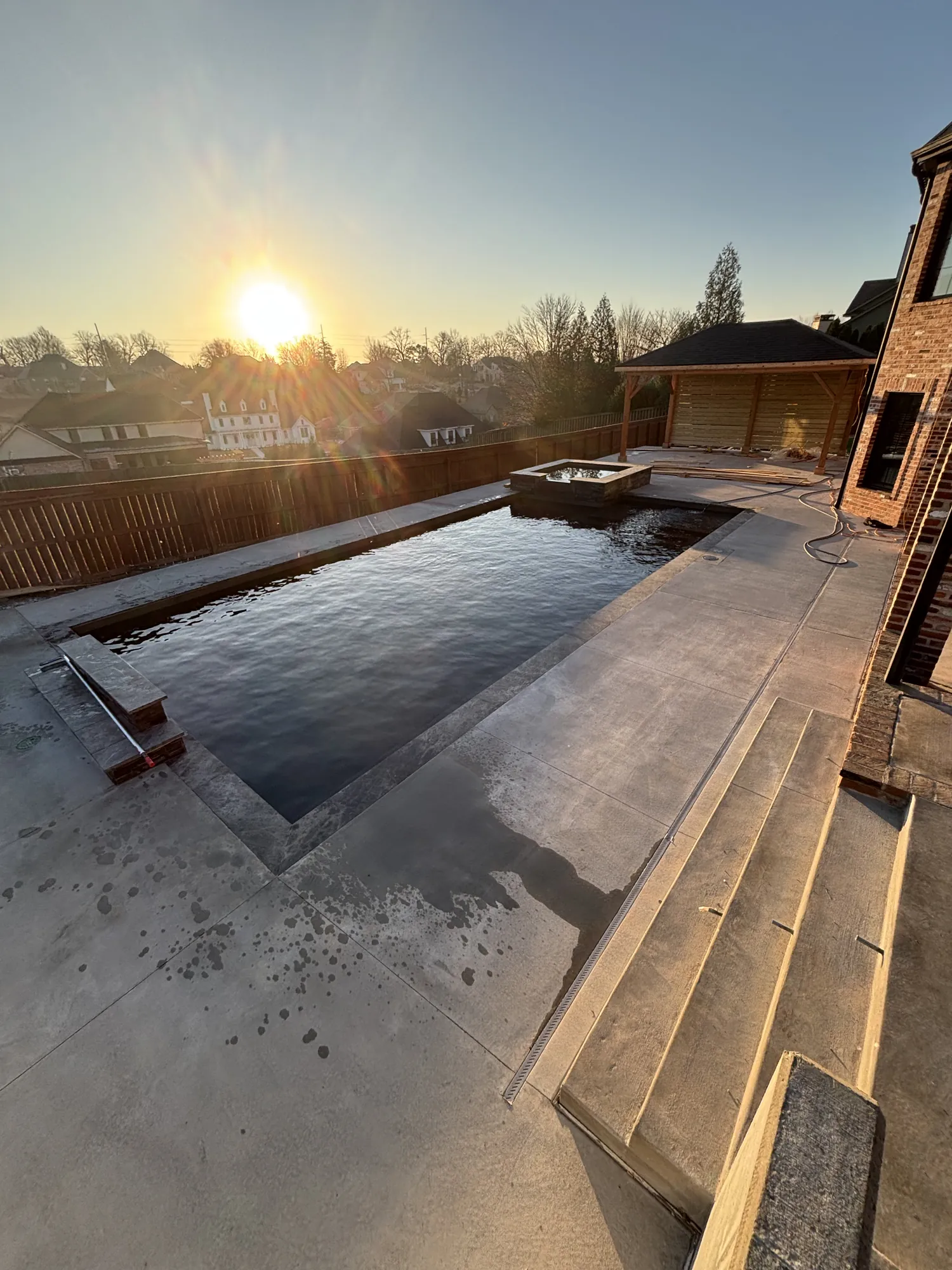 Custom pool and spa at sunset in Northwest Arkansas