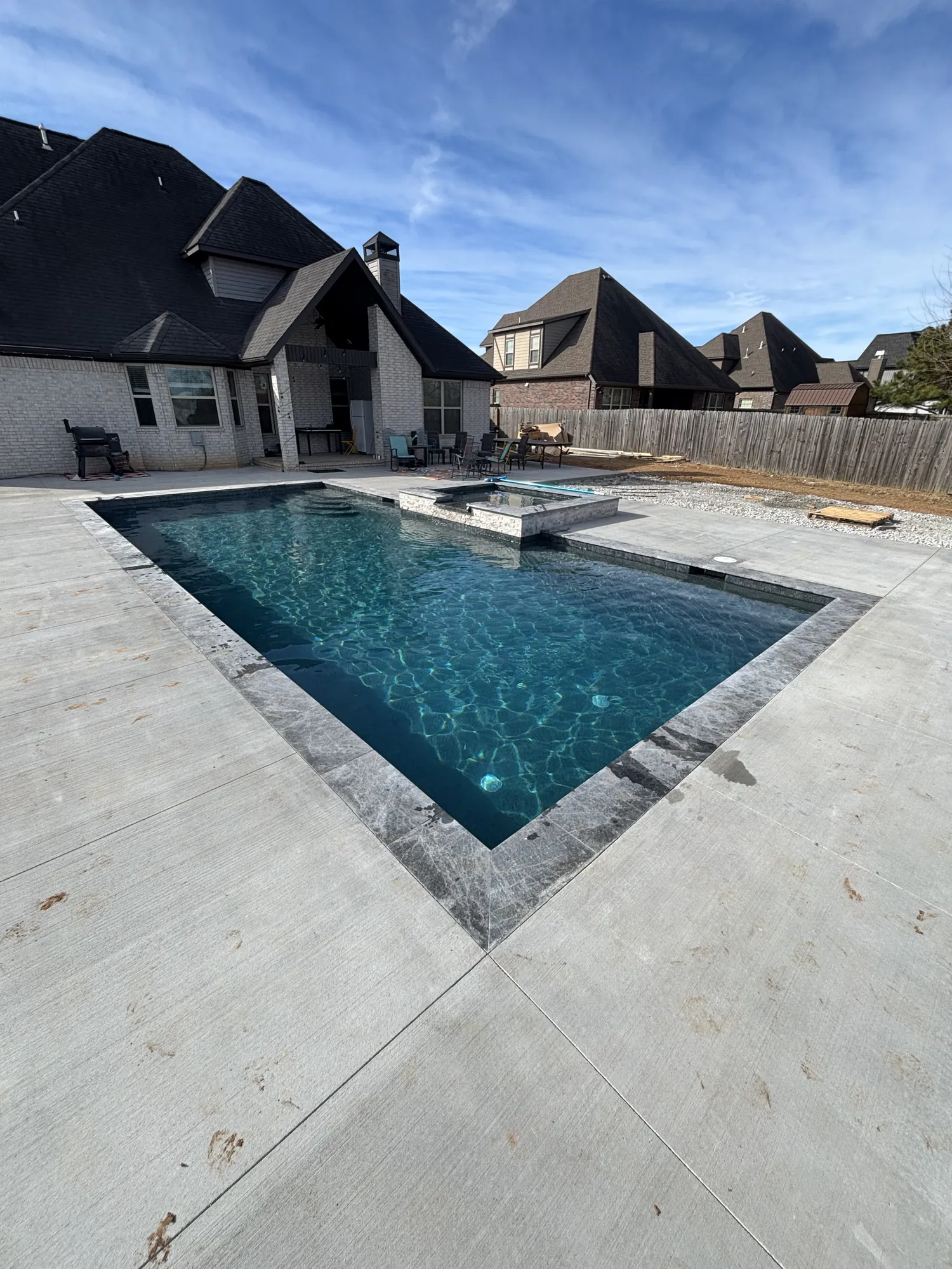 Custom in-ground pool by Advanced Pools & Spas in Northwest Arkansas