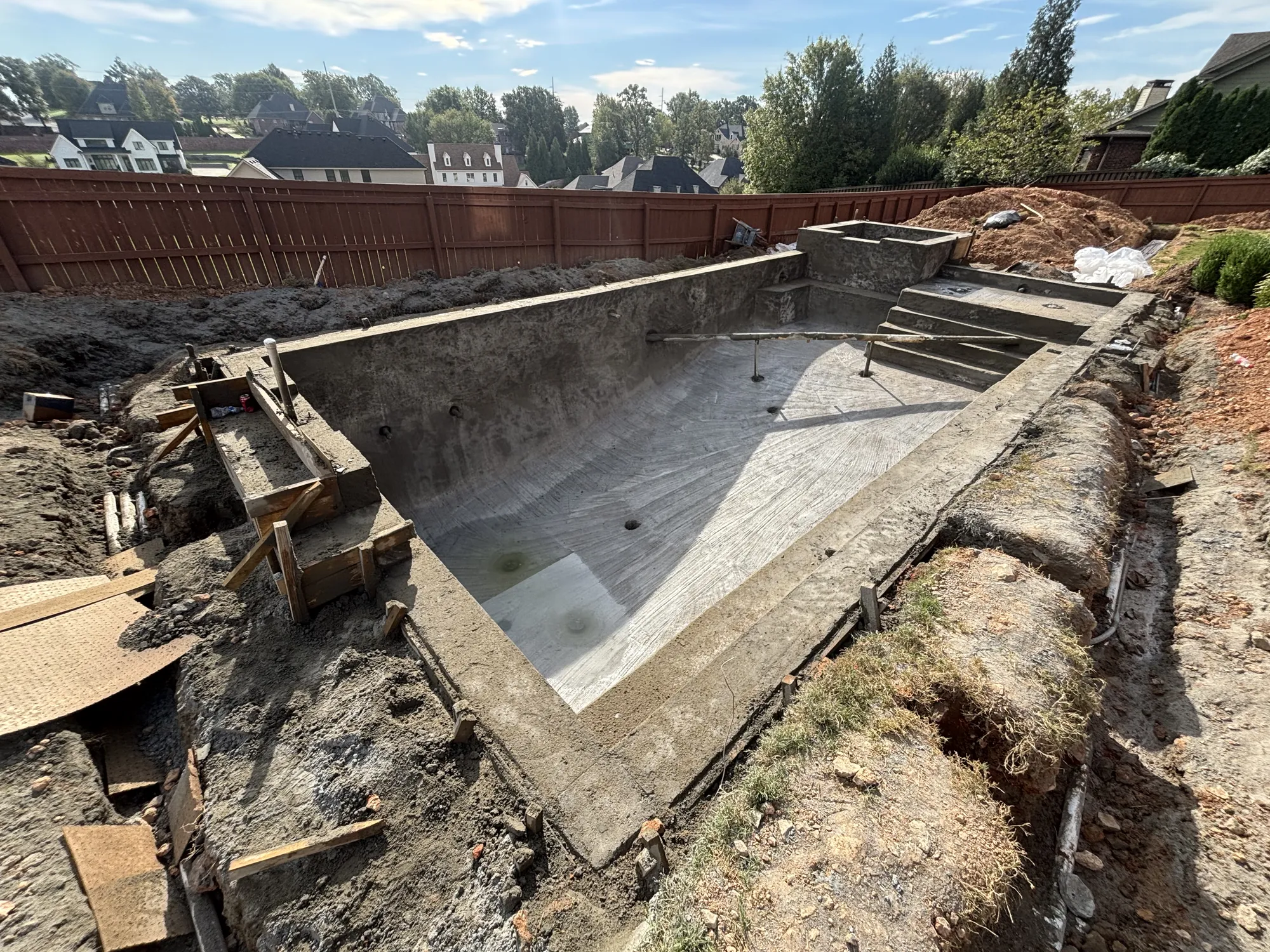 Custom pool shell with steps and bench in Northwest Arkansas