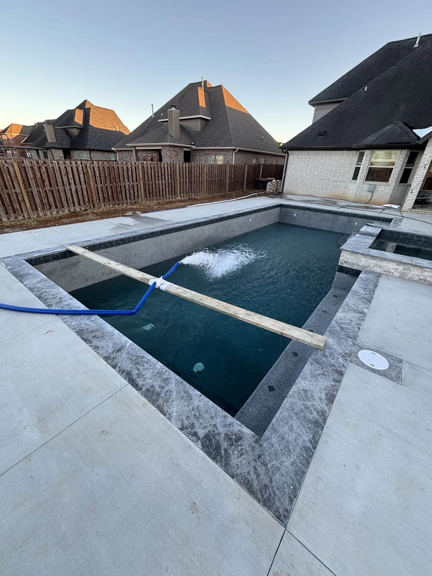 Custom in-ground pool by Advanced Pools & Spas in Northwest Arkansas