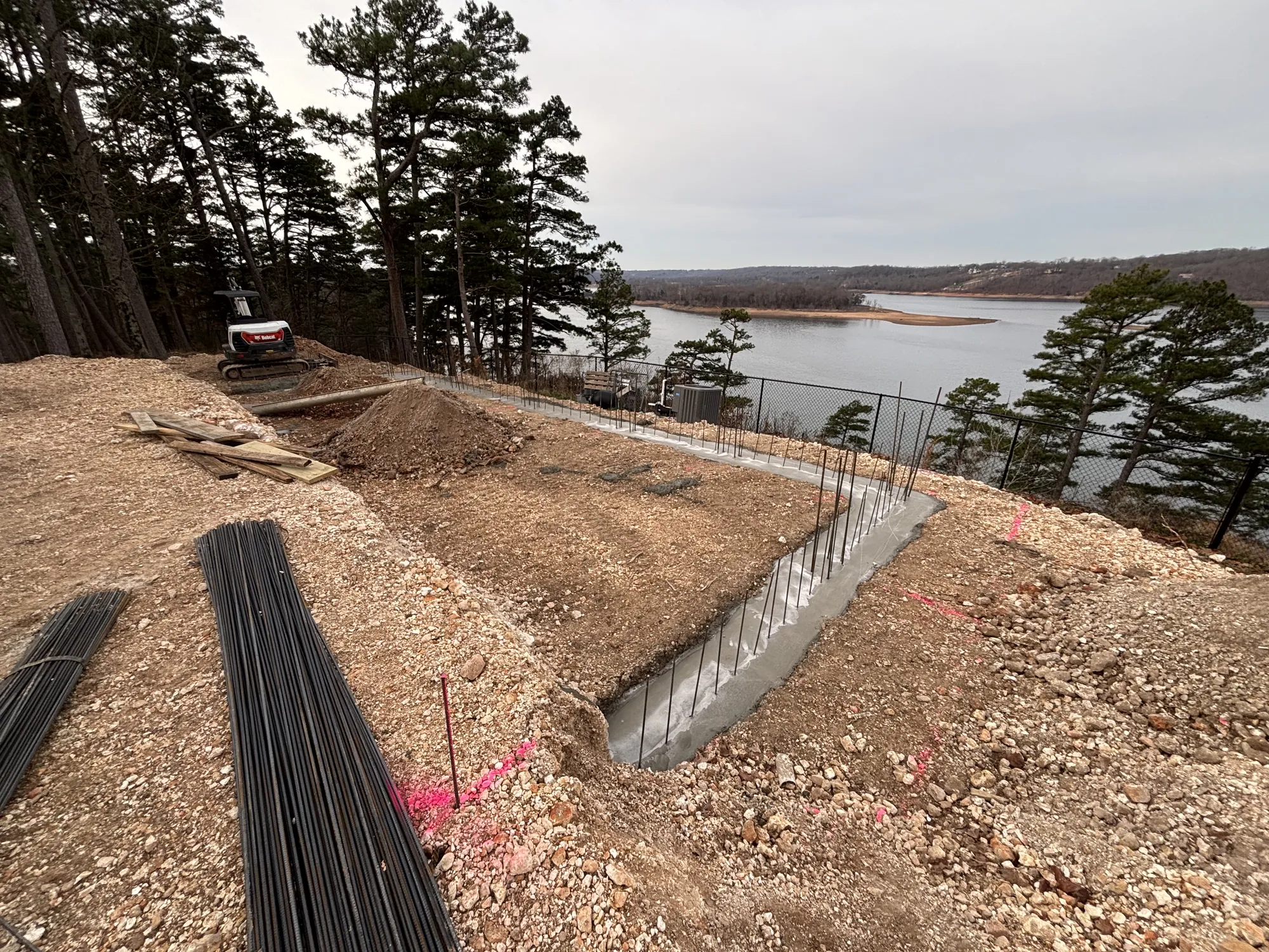 Steel reinforcement for lakeside pool foundation in Northwest Arkansas