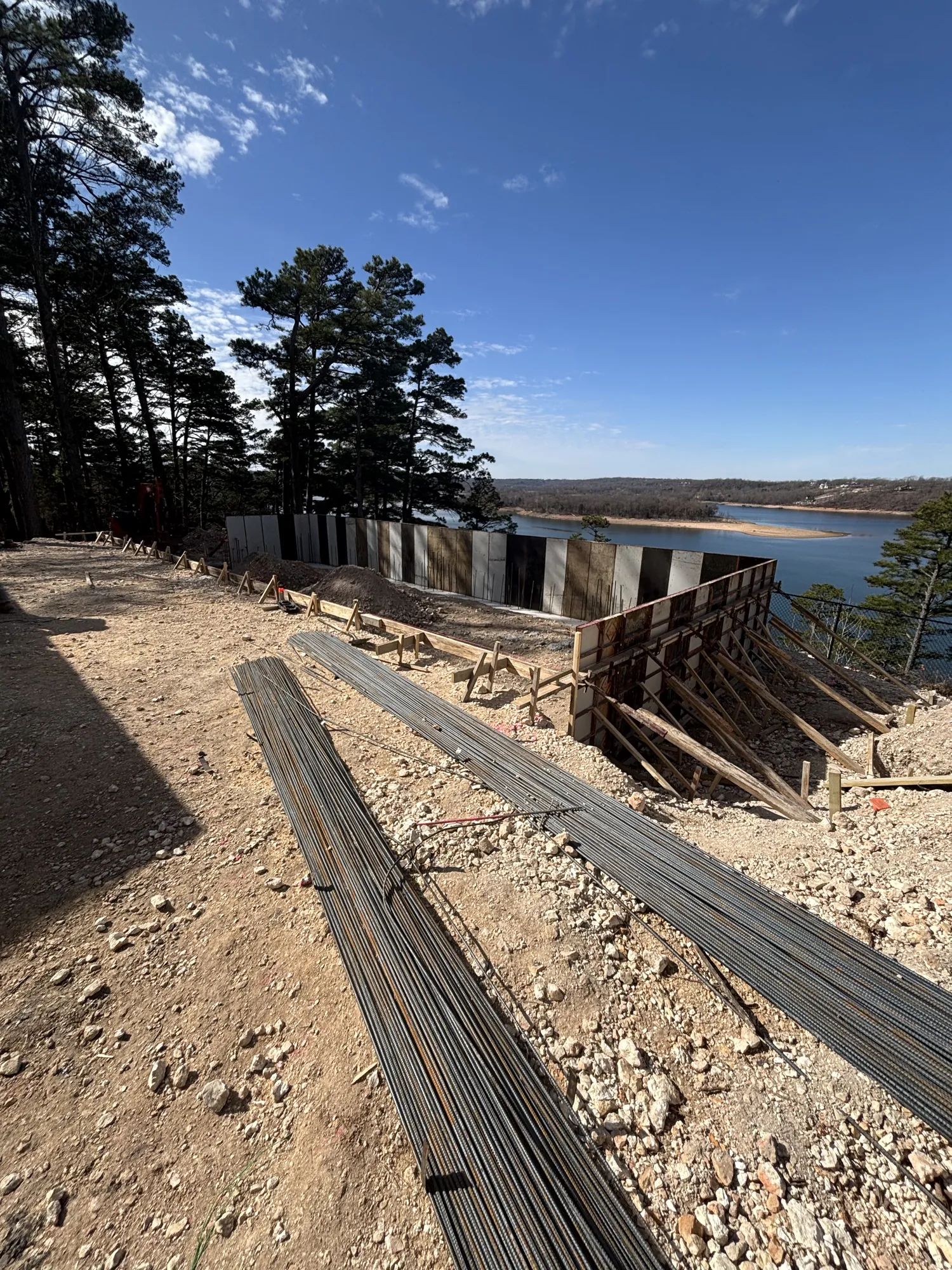 Retaining wall formwork at lakeside pool build in Northwest Arkansas