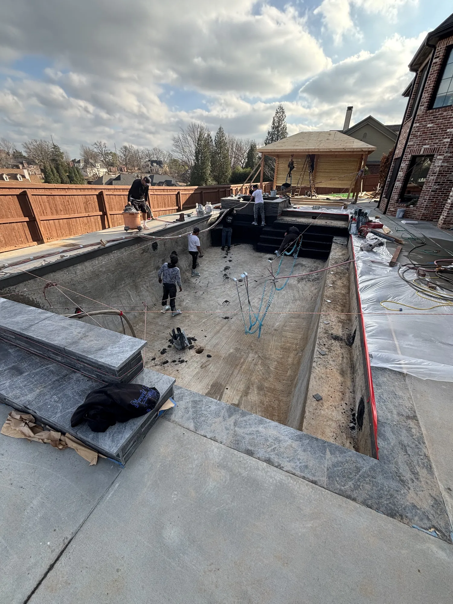 New pool shell with concrete coping in Northwest Arkansas