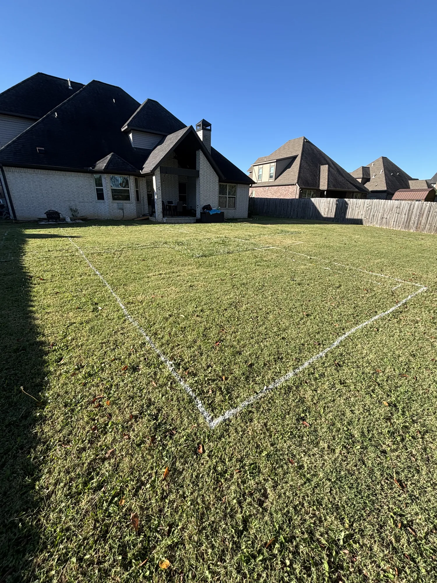 Pool layout staking at residential build in Northwest Arkansas