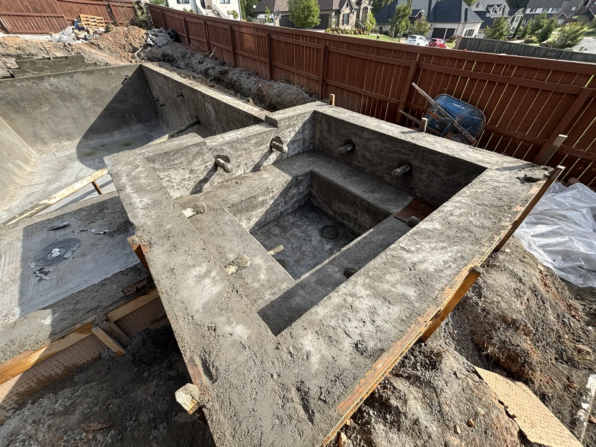 Pool shell with raised spa mid-construction in Northwest Arkansas