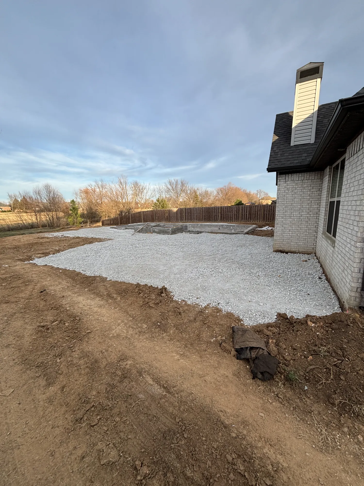 Pool site gravel base preparation in Northwest Arkansas