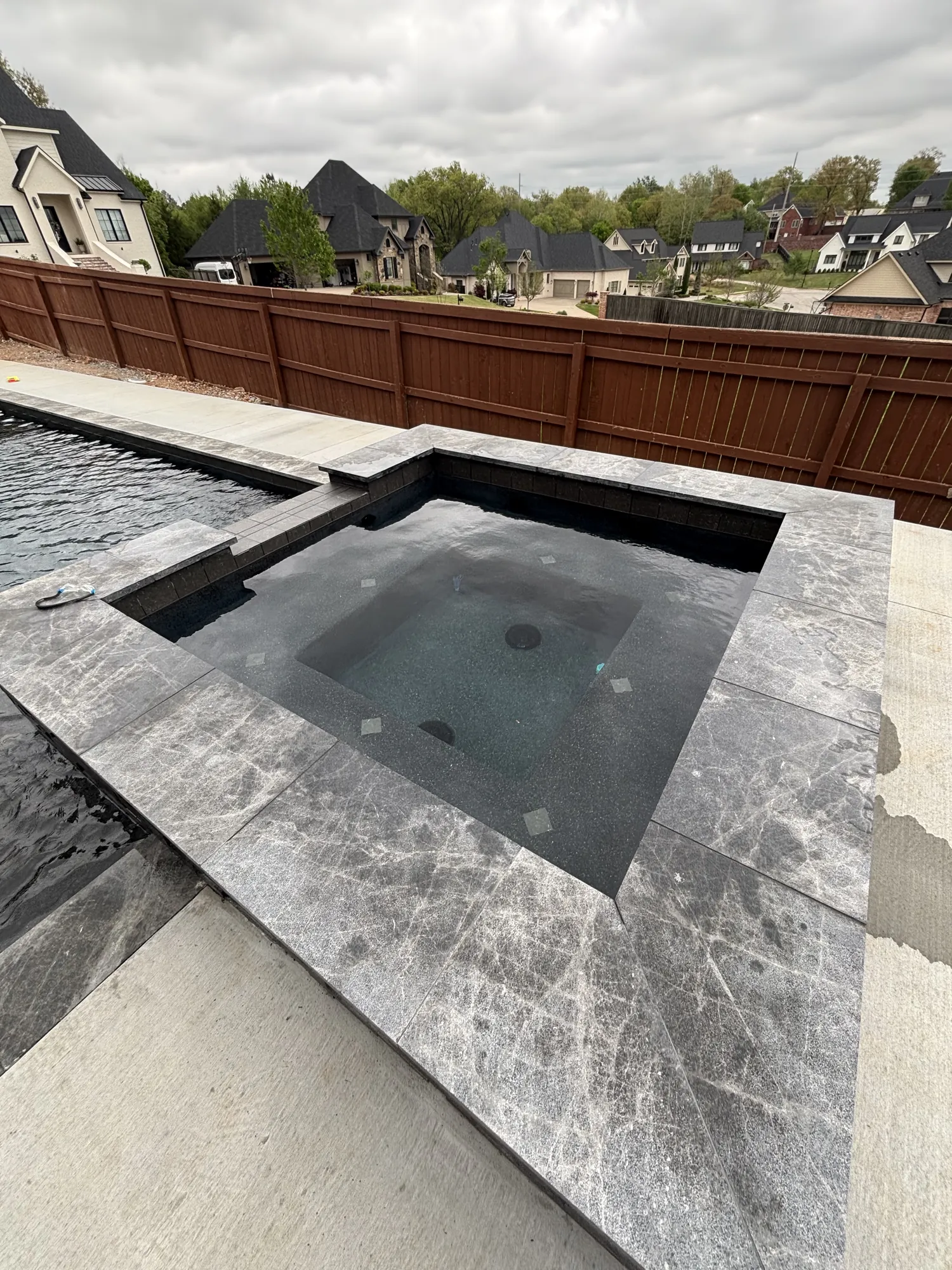 Raised spa marble surround detail in Northwest Arkansas