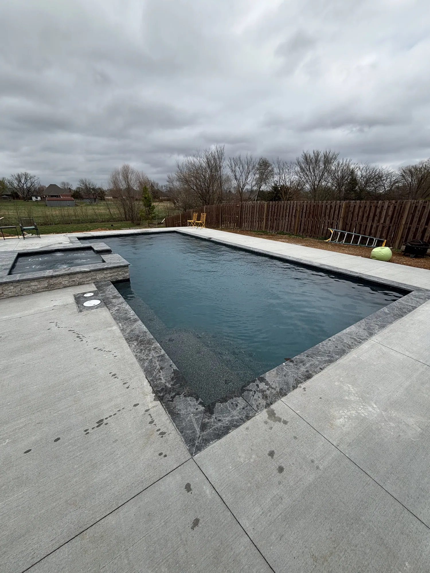 Restored landscaping after pool installation in Northwest Arkansas